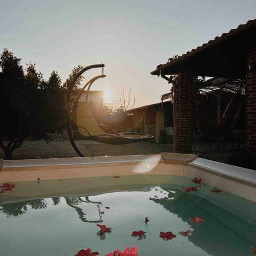 Sunset in front of the hot tub, at Vintage Stone House